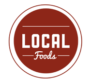A reddish-brown circle with white text stating "Local Foods"
