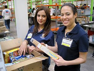 Keegan groups volunteering at the Houston Food Bank 
