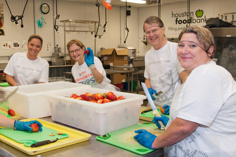 Volunteers prep food in our former Keegan Kitchen.