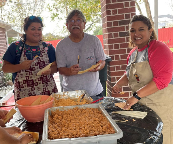 Promo-600×500-01 Making Tamales In this photo from left to right (Christina (Tia), Manuel (Grandfather), Cyndi (Mother)