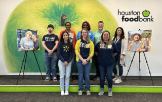 Walmart employees volunteering with Houston Food Bank to Fight Hunger and Spark Change!