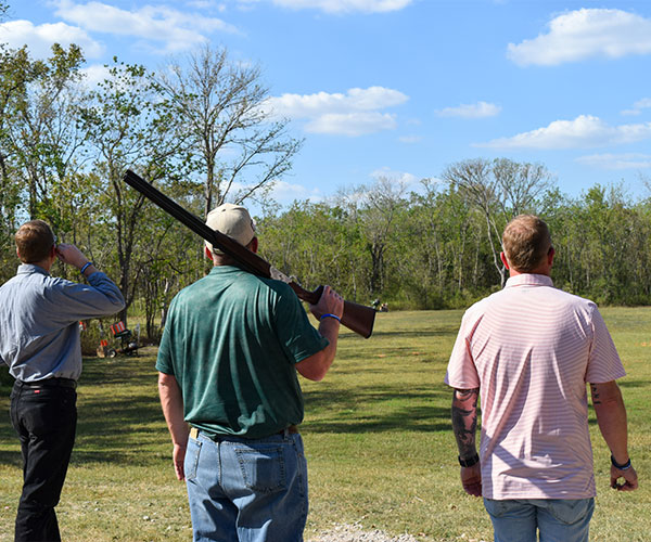Backpack-Blast-600x500b Three Backpack Blast competitors watch a clay pigeon.
