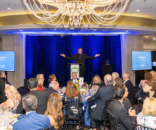 Brian Greene, Houston Food Bank CEO, address the Chefs' Dinner audience.