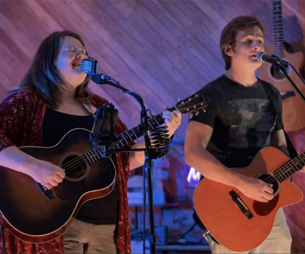 Krista Gene and Joseph Crump are Houston-based singer-songwriters who recently teamed up to blend expressive vocals and guitar work. Their performances feature tight vocal harmonies and guitar solos, along with a mix of original songs drawn from rock, blues, country, R&B, and touches of jazz. Their live performances balance stripped-down acoustic songwriting with bluesy improvisation and dynamic arrangements.