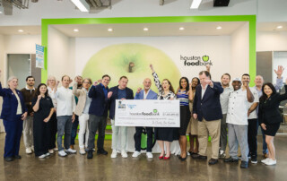 Houston Restaurant Weeks presents the 2025 check to Houston Food Bank