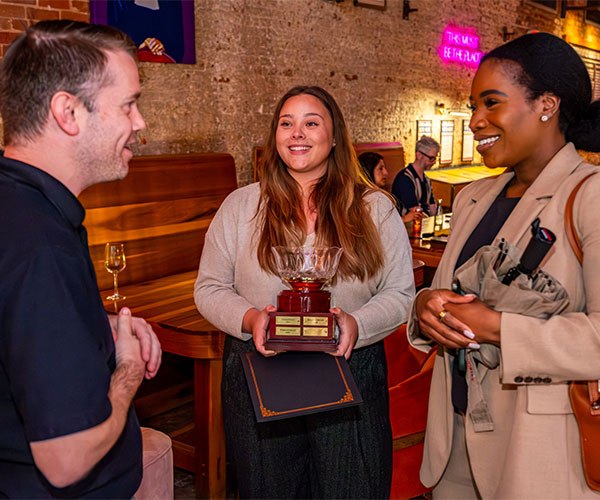 FftB 600×500 01 Food from the Bar winners talk with HFB staff.