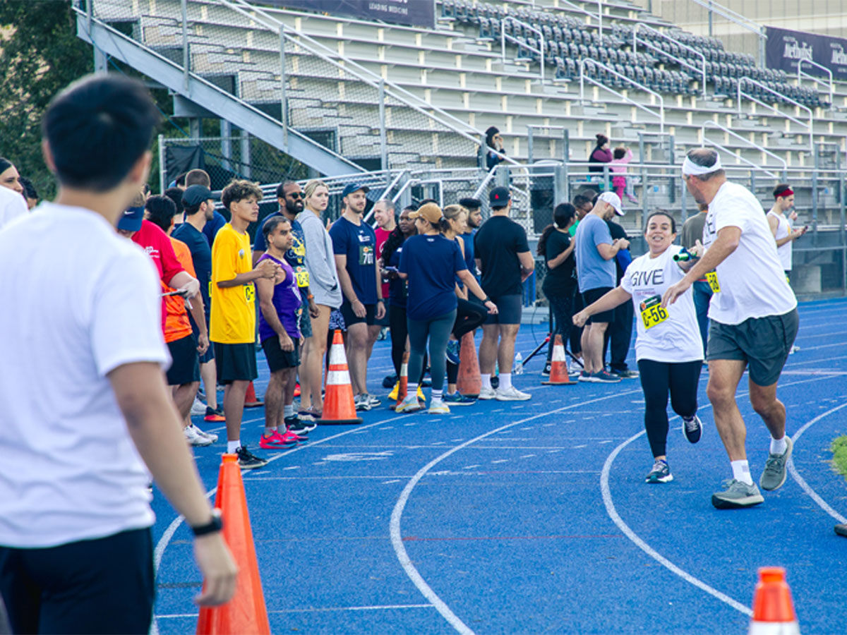 Runners pass the baton at the Harvest Marathon Relay